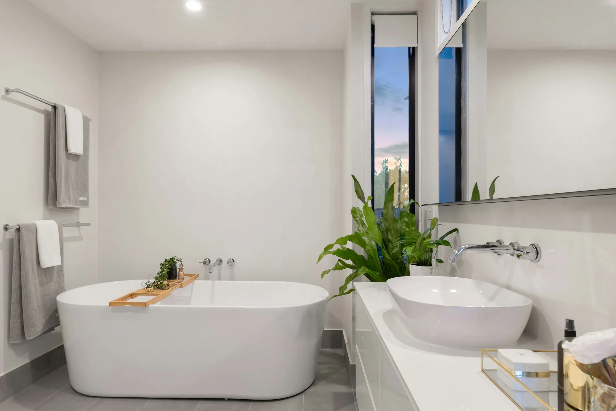 Newly remodeled bathroom with a tiled walk-in shower and a floating vanity