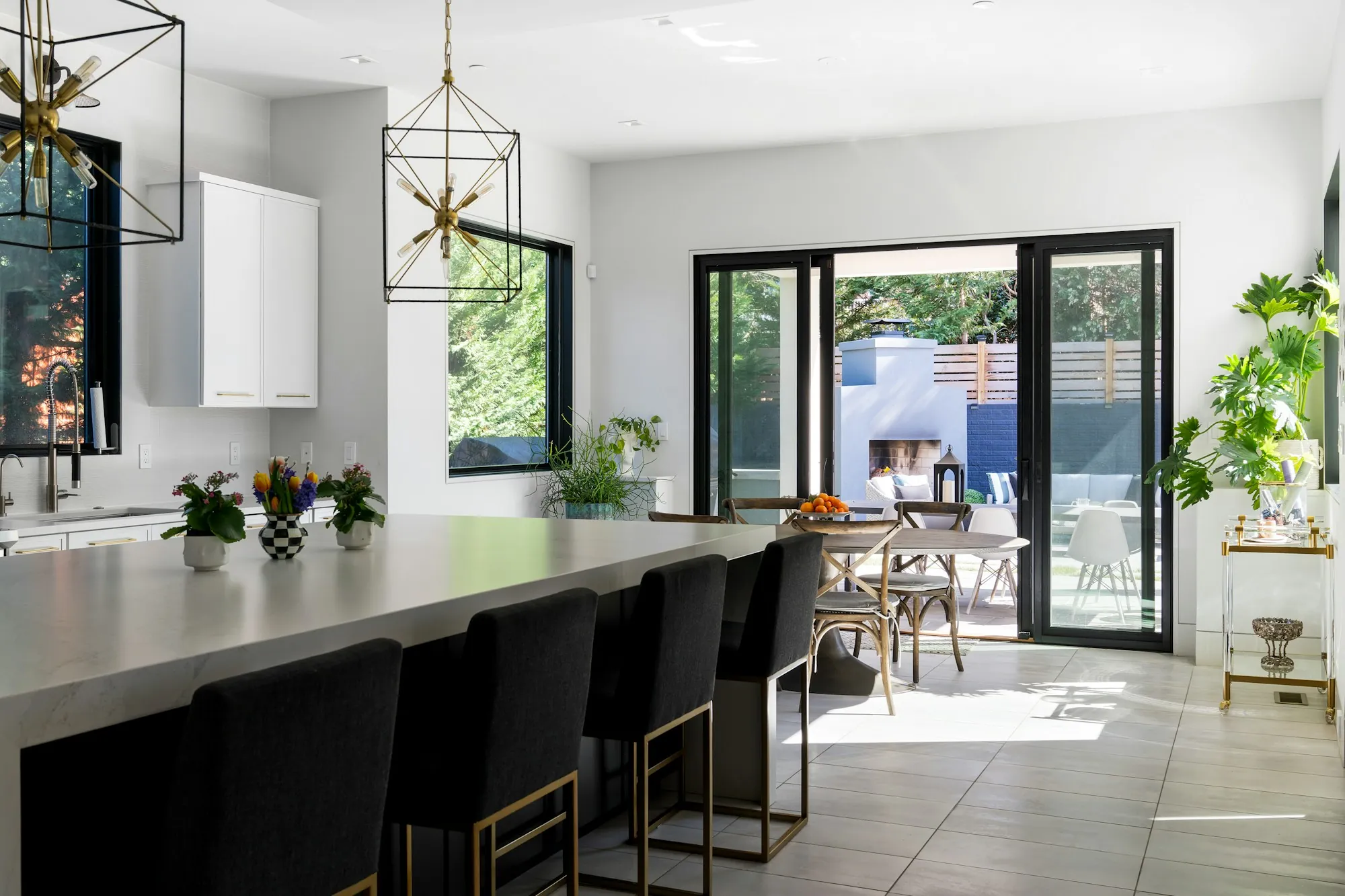 Open kitchen with a large island, new cabinets and under-cabinet lighting